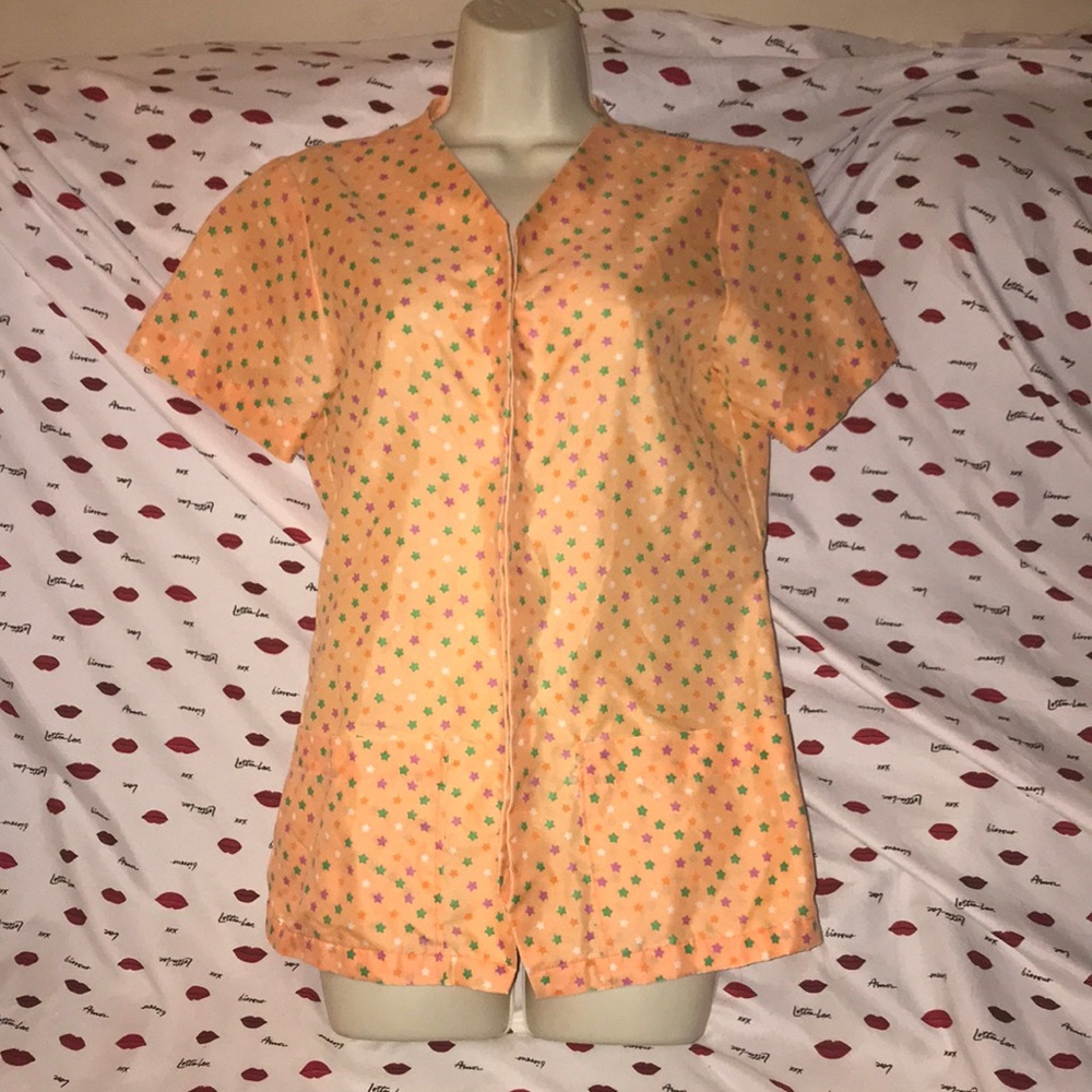 Orange with stars button down scrub top small/med